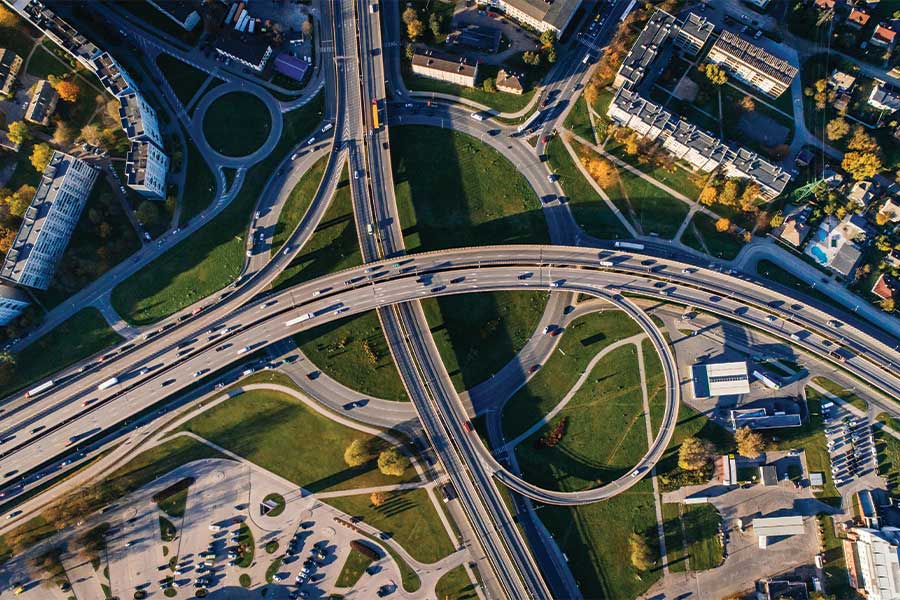 Unassigned traffic blog photo or cars going down different roads Photo by Aleksejs Bergmanis: https://www.pexels.com/photo/aerial-photo-of-buildings-and-roads-681335/